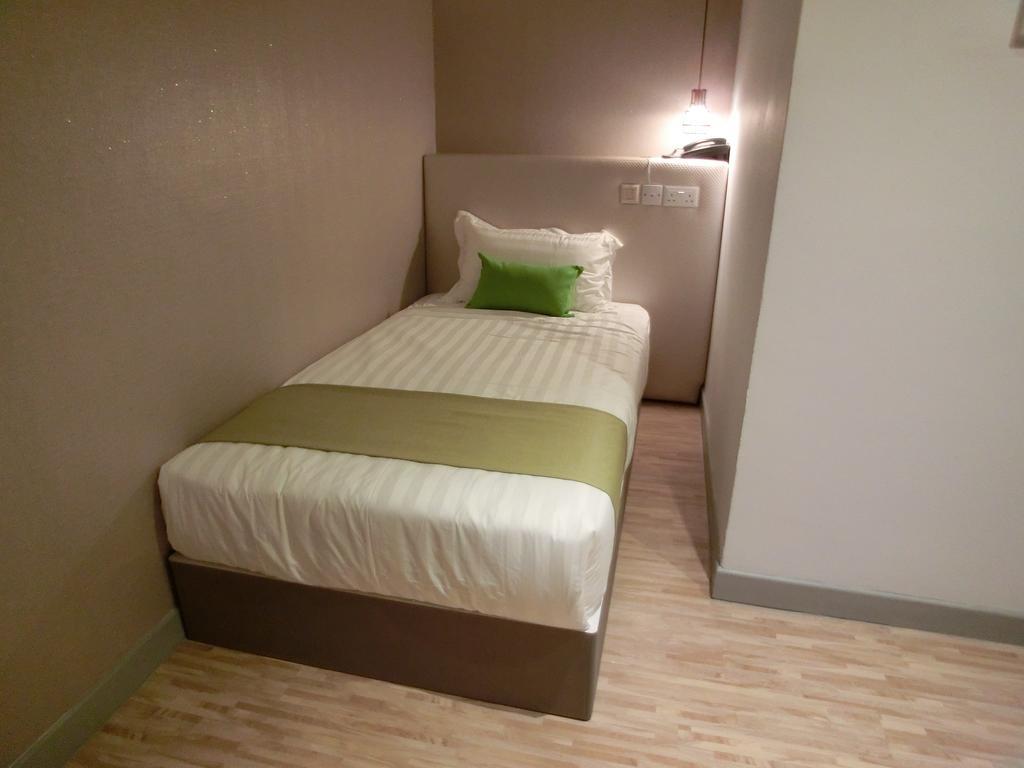 Champion Hotel Сингапур Номер фото